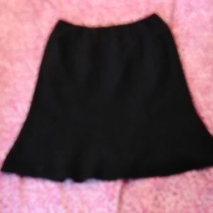 Two black skirts
